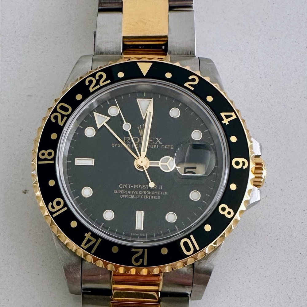 Rolex GMT-Master II Black Dial with Gold Bezel